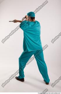 01 2018 04 FALCO DOCTOR WITH GUN AND KNIFE